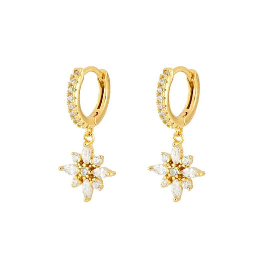 Gold huggies with clear CZ flower charms.