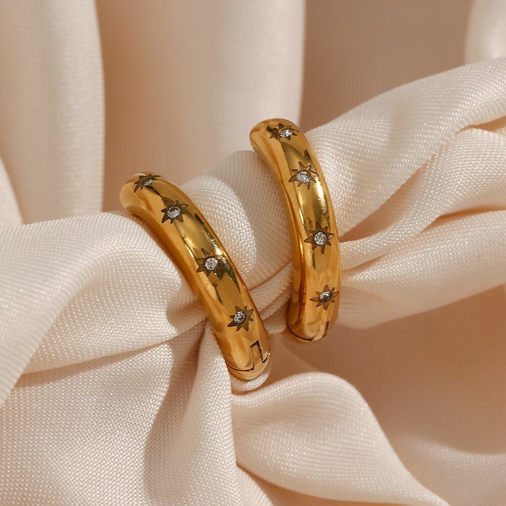 Closeup of the engraved stars with tiny CZ stones.